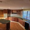 From Aged Timber to a Crisp White Finish: A Kitchen Transformation